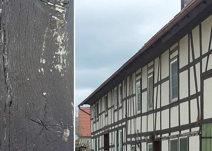 Die Holzfarbe blättert bereits ab.