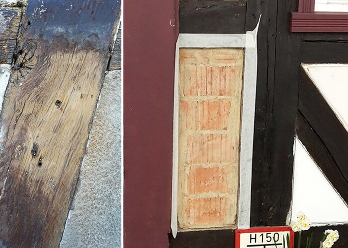 Die Balken werden bis auf das Holz abgeschliffen.
